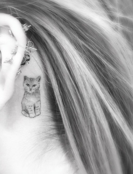 Small Cat Tattoo Behind The Ear by Doctor Woo