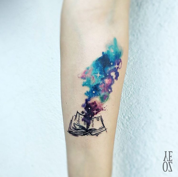 Cosmic book tattoo by Yeliz Ozcan