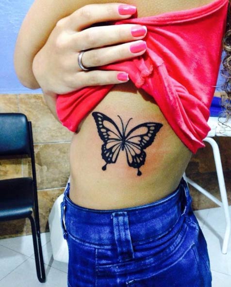 Butterfly Tattoo on Ribcage by Dioney Martins.