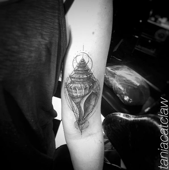 Geometric Conch Shell Tattoo by Tania