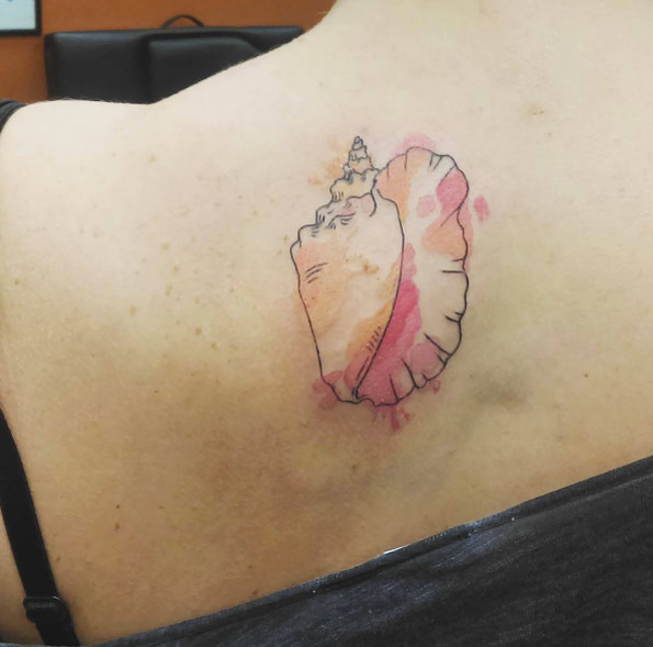 Watercolor Conch Shell Tattoo by Emily Geiger
