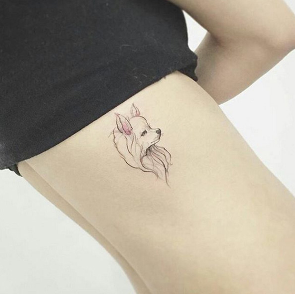 Dog Tattoo on Ribcage by Flower