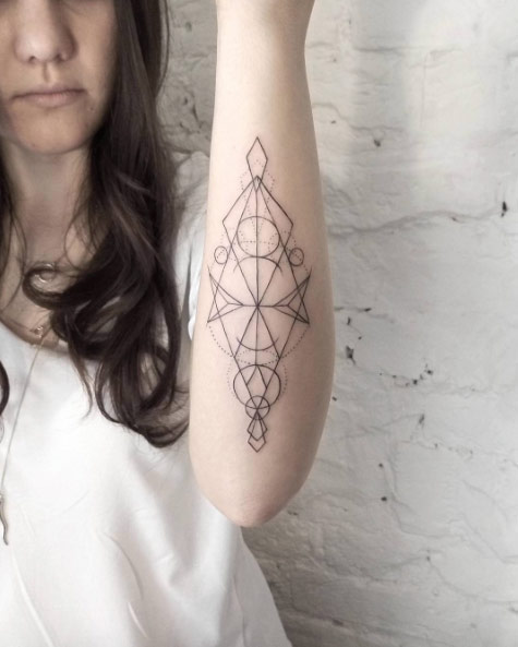 Geometric Forearm Tattoo by Dasha Sumkina