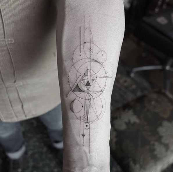 Intricate Geometric Forearm Tattoo by Nando
