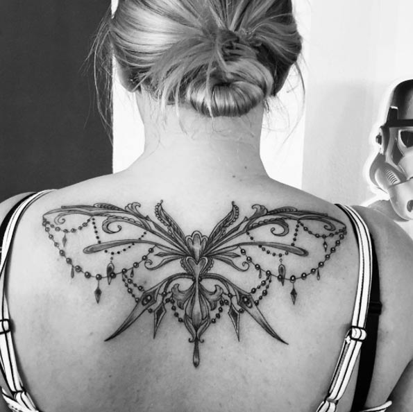Ornamental Butterfly Tattoo on Back by Anastasia Windhorst