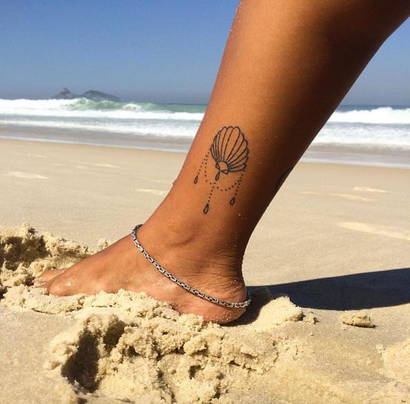 Ornamental Shell Tattoo on Ankle by Amanda Guarany