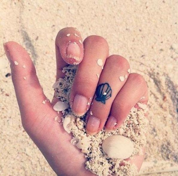 Shell Tattoo on Finger