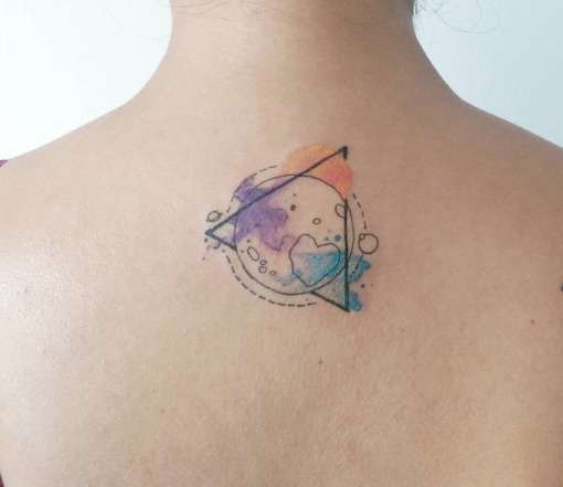 Watercolor Pluto Tattoo by Baris Yesilbas