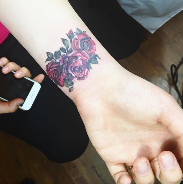 Roses on Wrist by Mojo