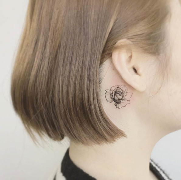 Behind-the-ear floral by Flower Tattooist