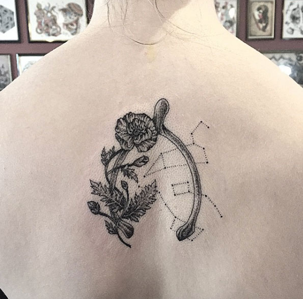 Constellation wishbone tattoo on back by Annita Maslov