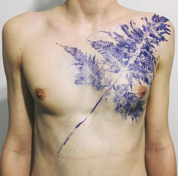 Large fern on chest by Rita