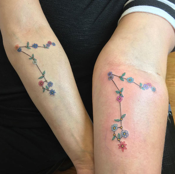 Matching floral constellation tattoos by Xina