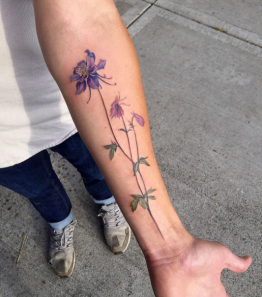 Columbine blossoms on forearm by Amanda Wachob