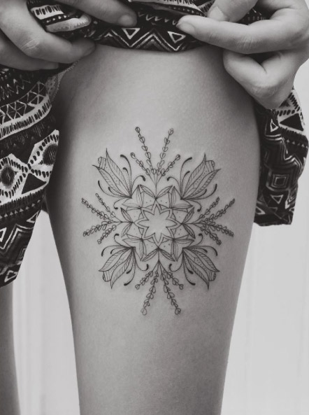 Mandala floral piece on thigh by Tritoan Ly