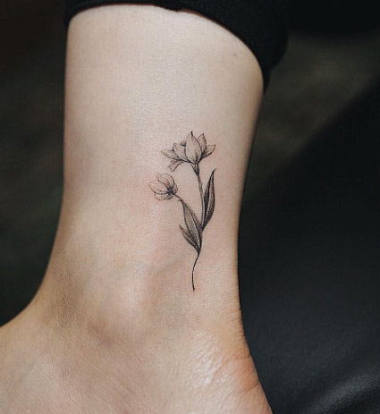 Floral ankle work by Nando