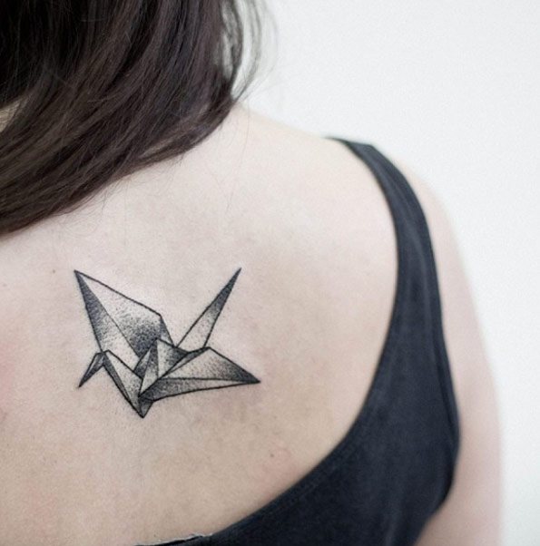 Black and grey ink origami crane by Uls Metzger