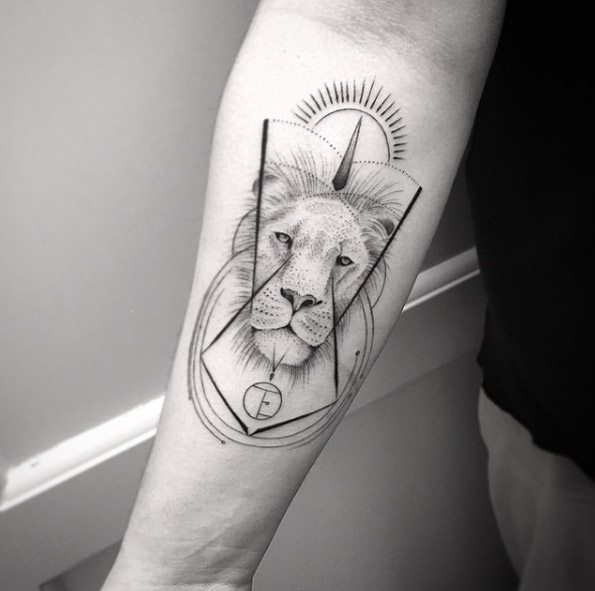 Lion on forearm by Balazs Bercsenyi