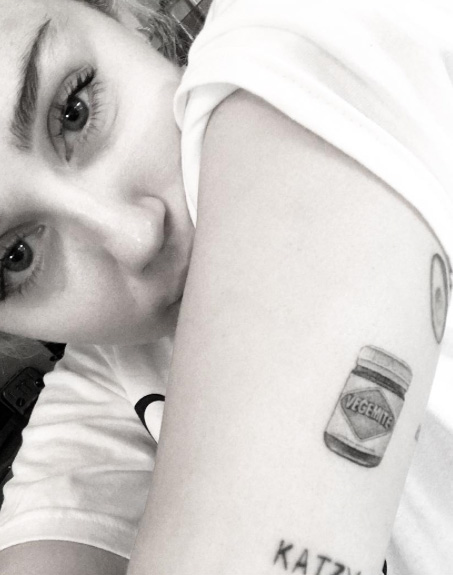 Miley Cyrus' Vegemite tattoo by Doctor Woo