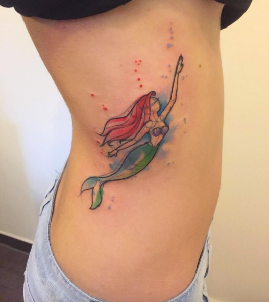 Watercolor Ariel tattoo on rib cage by Bora Tattoo Studio