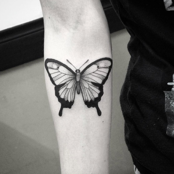 Blackwork butterfly tattoo by Tiago Oliveira