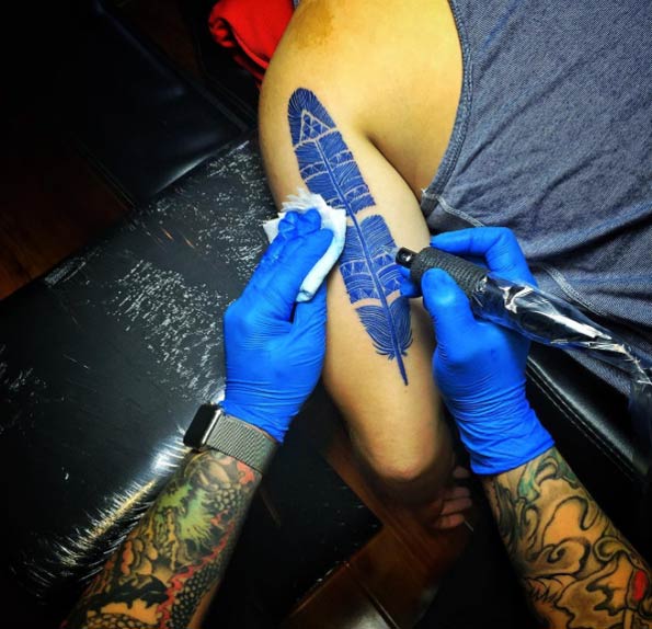 Blue Indian feather by Sara Tattoo