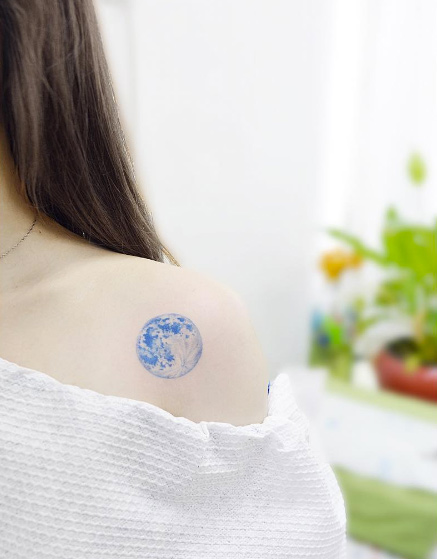 Tiny blue moon tattoo by Banul