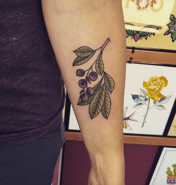 Blueberry branch tattoo by Erica Kraner