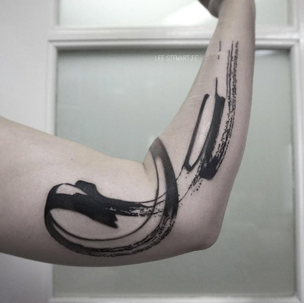 Abstract brush stoke tattoo by Lee Stewart