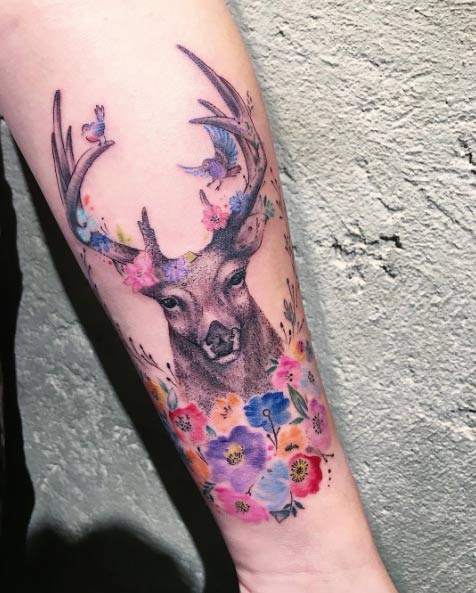Floral deer tattoo by Eva Krbdk