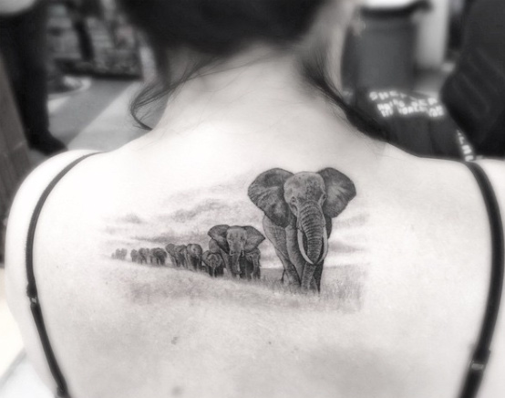 Awesome elephant landscape tattoo by Doctor Woo