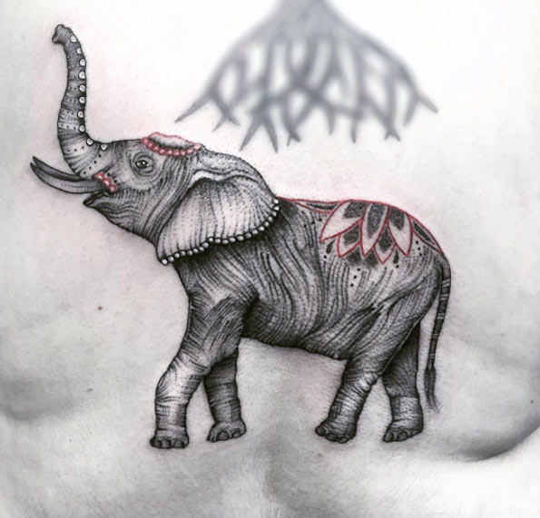 Engraved elephant tattoo by Jess Ika