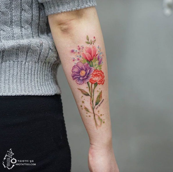 Floral bouquet on forearm by Silo