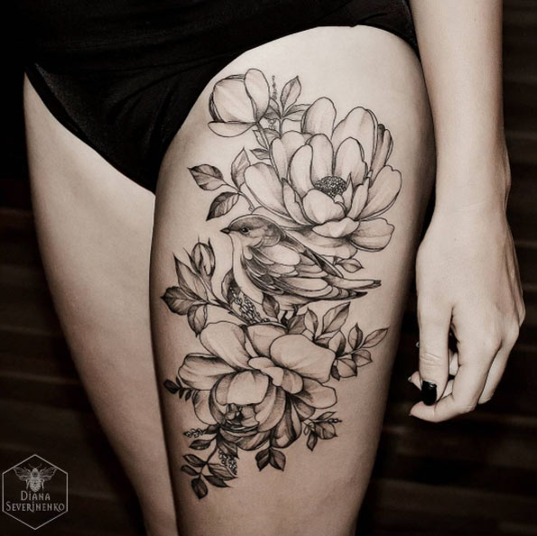 Spectacular floral work on thigh by Diana Severinenko