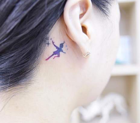 Starry behind-the-ear Peter Pan piece by Banul