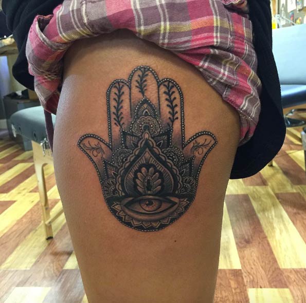 Hamsa hand on thigh by 8 Golden Falcons