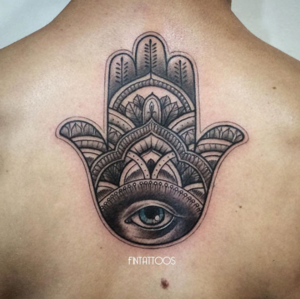 Hamsa hand on back by Fin Tattoos