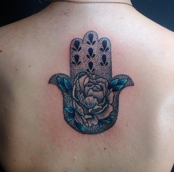 Hamsa hand with small turquoise leaves by Klaudia Hołda
