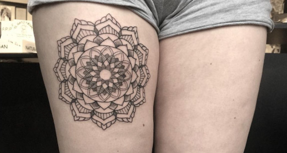Mandala flower on thigh by Poppy Segger