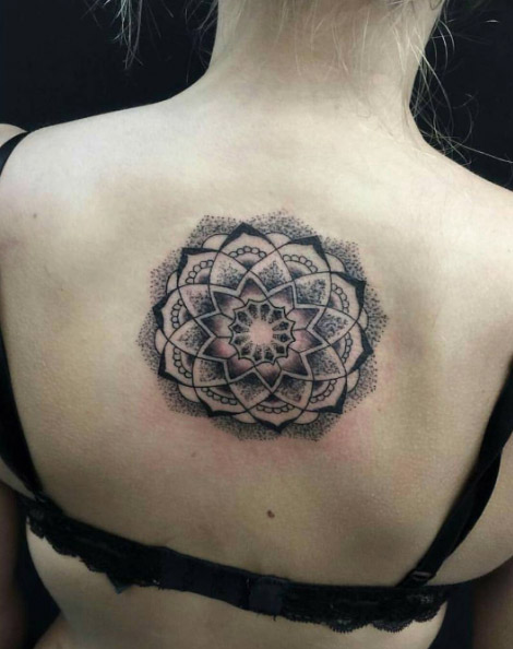 Mandala flower on back by Victims of Ink