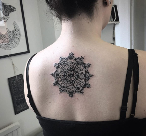 Mandala flower on back by Alex Bawn
