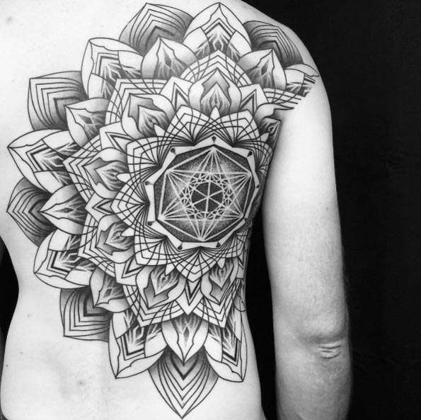 Geometric mandala flower on back by Mathieu Kes