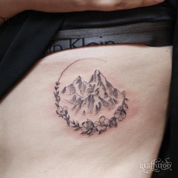 Floral mountain piece by Tattooist River
