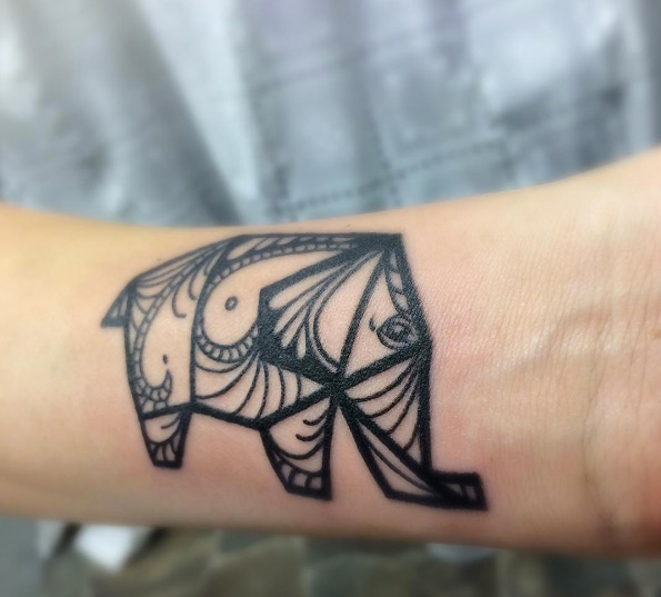 Origami-esque elephant tattoo by Cybil Souza and Jason Hayes