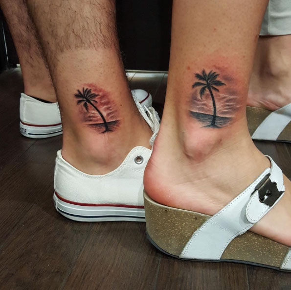 Matching palm tats by Miami Tattoo Co.