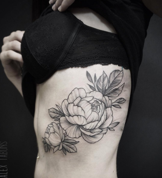 Large peonies on rib cage by Alex Tabuns