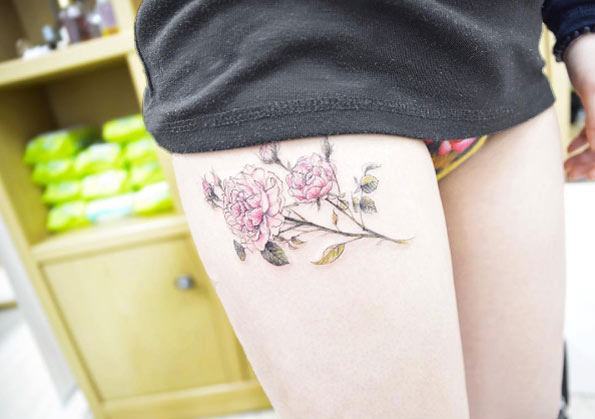 Peonies on thigh by Banul
