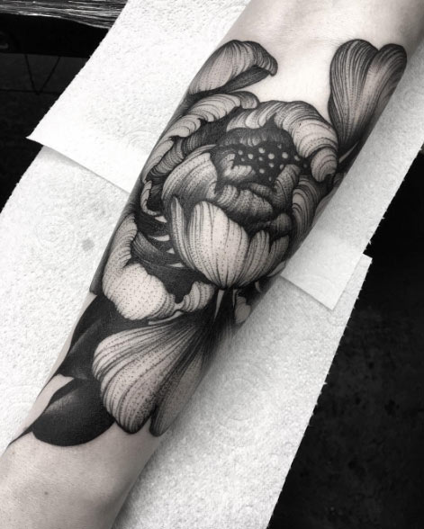 Large peony on forearm by Kelly Violet