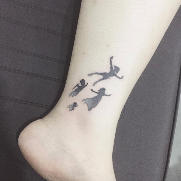 Peter Pan ankle tattoo by Tattooist Flower