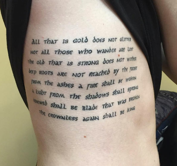 Large quote on rib cage by Ana